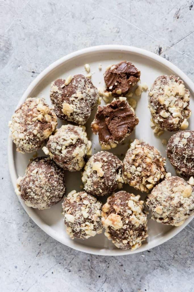 Image of a keto-approved sugar-free dessert without artificial sweeteners: Keto fat bombs on a white plate