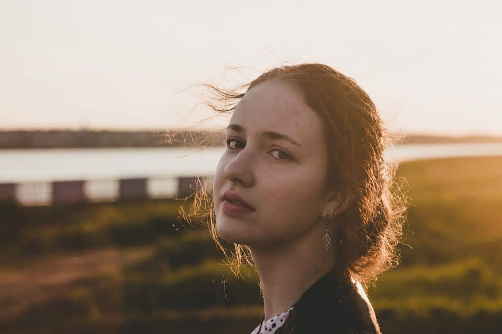 Image of a young women with real baby hairs and flyaways