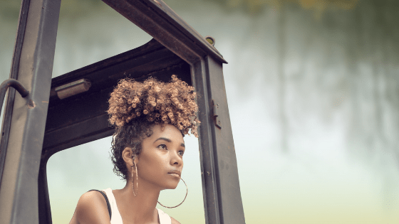 A young woman wearing the pineapple hairdo